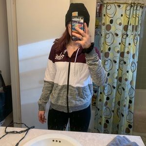 Maroon, white, and grey zip up